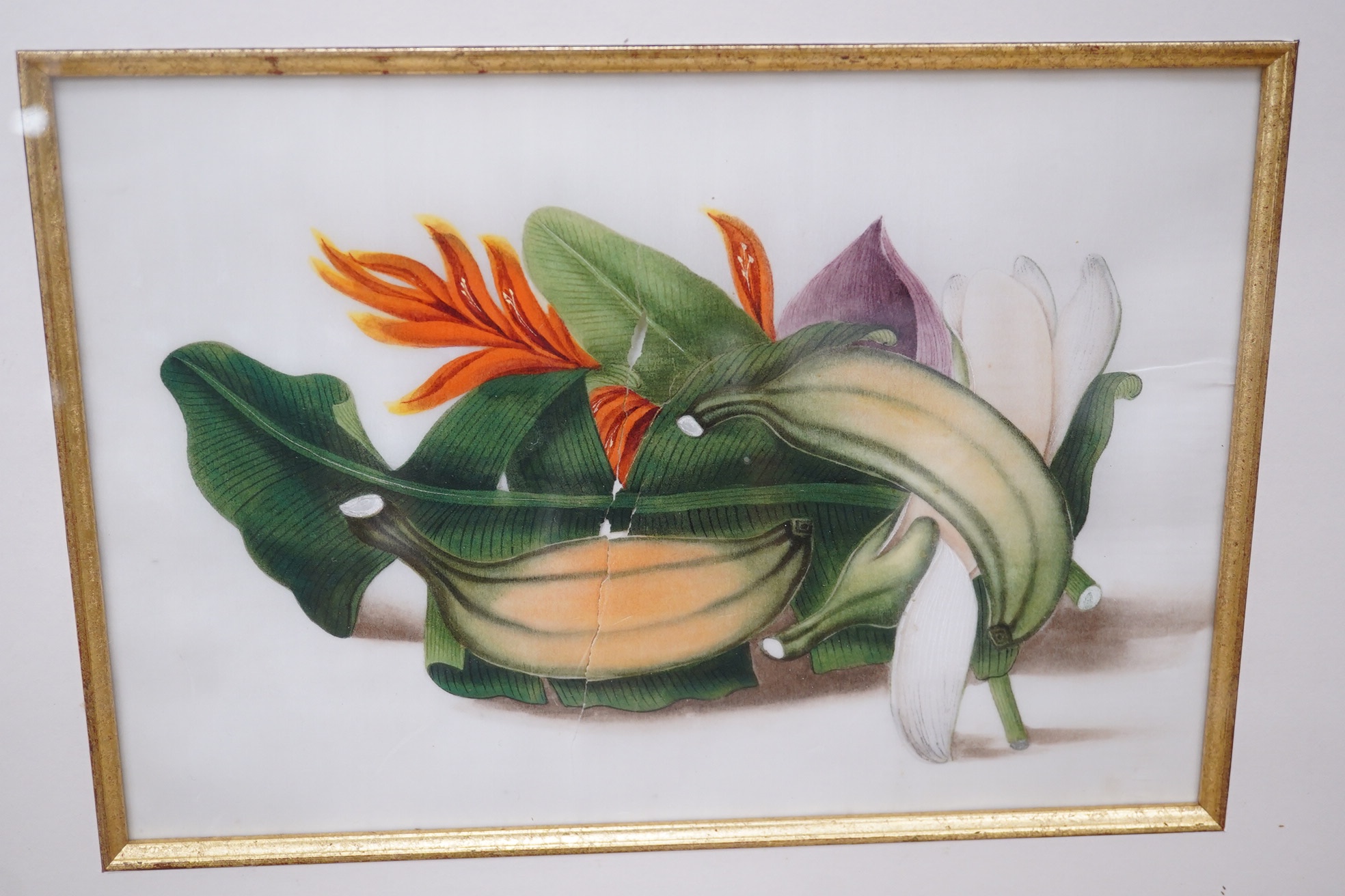 Mid 19th century, Chinese School, set of four pith paintings, Still lifes of fruit and vegetables, 18 x 26cm. Condition - poor, rips to the paper